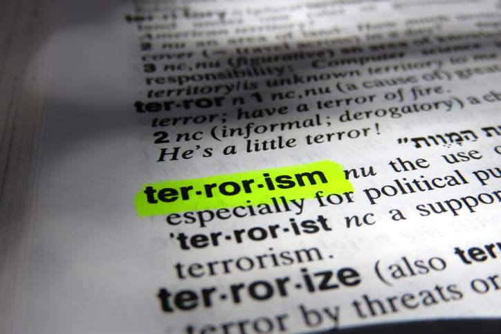 terrorism definition highlighted yellow