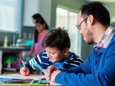 father and son drawing together