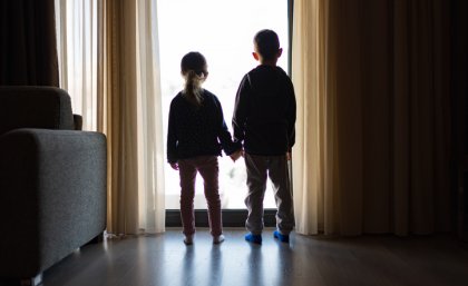 kids looking out door