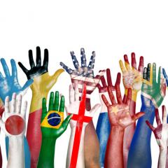 hands painted with flags