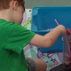 child playing with tools
