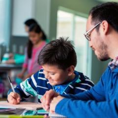 father and son drawing together