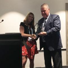 Matt Sanders receiving his award