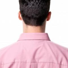 man in pink collared shirt