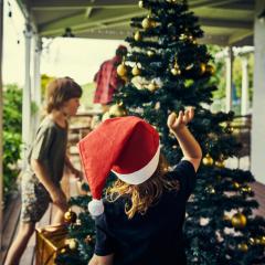children decorating Christmas tree 