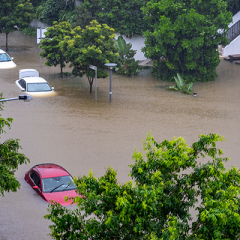 cars submerged in flood waters 