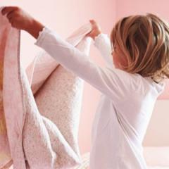 child making bed