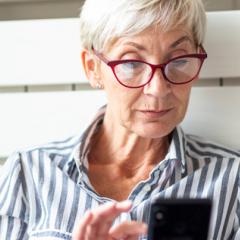 woman using app on her phone