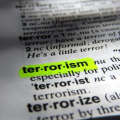 terrorism definition highlighted yellow